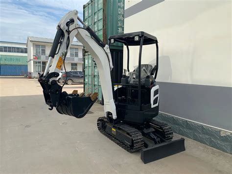 what is the biggest mini excavator|mini excavator with retractable tracks.